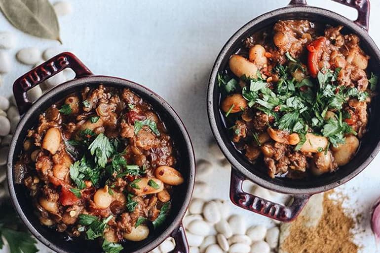 Two pots with lentil lamb chili